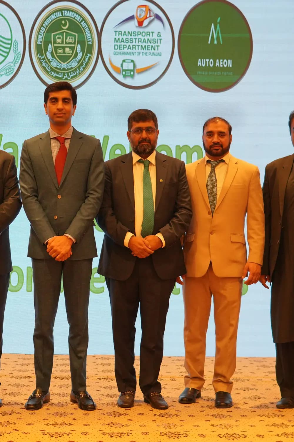 A commemorative shield presented on stage at the conference